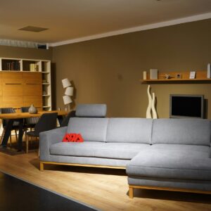 a living room filled with furniture and a flat screen tv